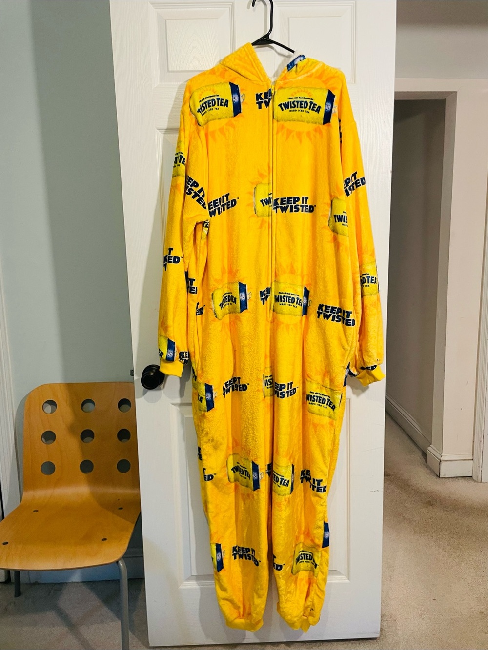 Twisted Tea Bright Yellow Hooded Adult Onsie.
